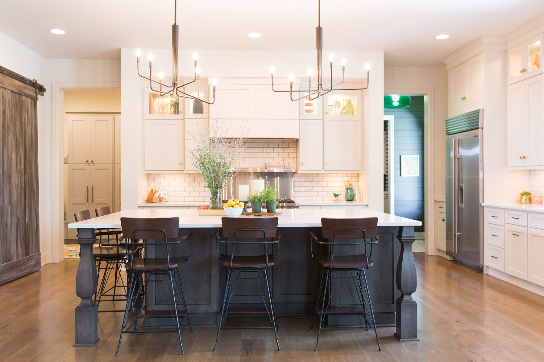 Contemporary kitchen with floating pendant lighting